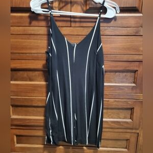 Black jumper with white stripes